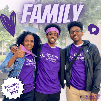 Text: Family Image of a family of three wearing Purple Walk gear and smiling